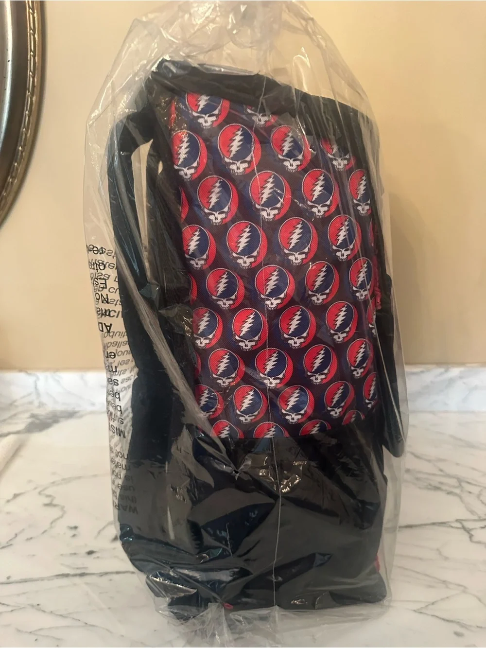 Igloo Black Backpack with Red and Blue Lightning Skull Patch